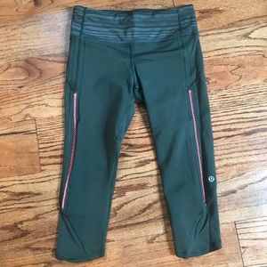 Lululemon green leggings with pink stitching